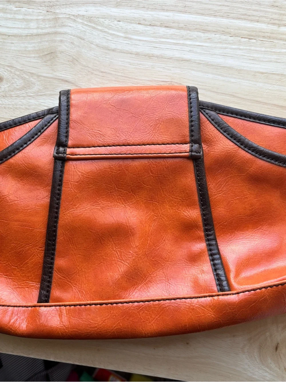 Elle Orange Faux Leather Clutch with Dark Trim